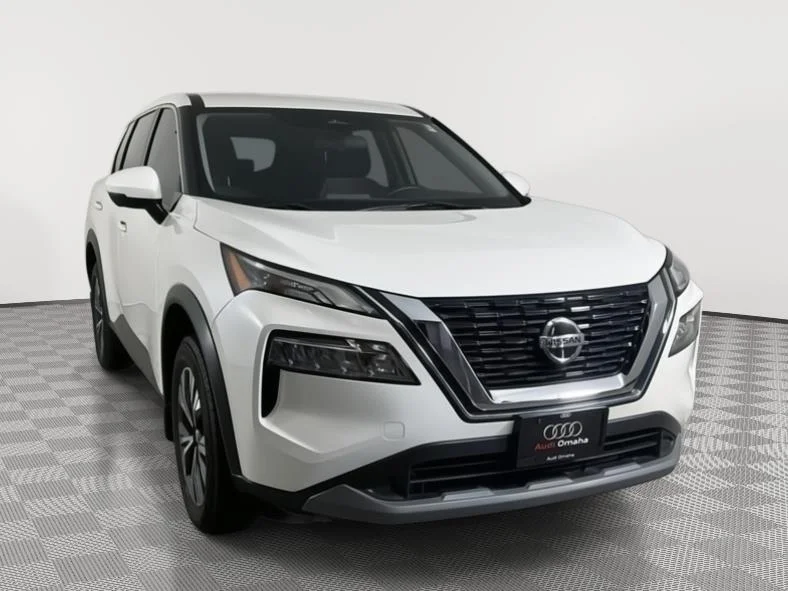 Used 2021 Caspian Blue Metallic Nissan SV image 1