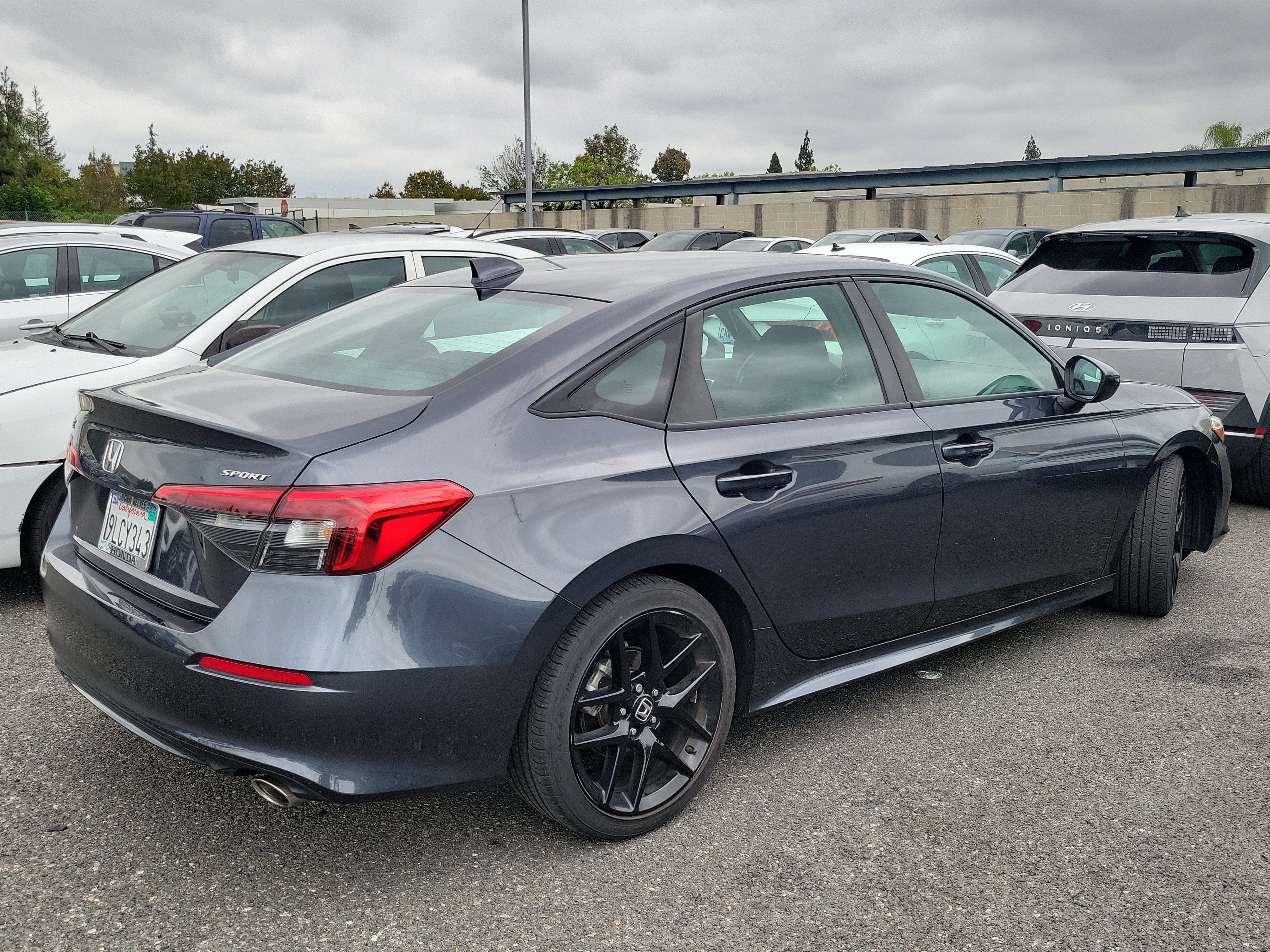 Used 2024 Meteorite Gray Metallic Honda Sport image 4