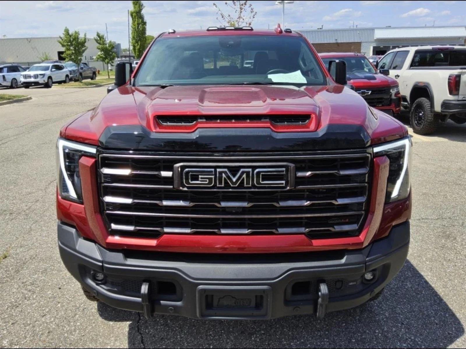 Used 2026 Volcanic Red Tintcoat GMC AT4X image 2