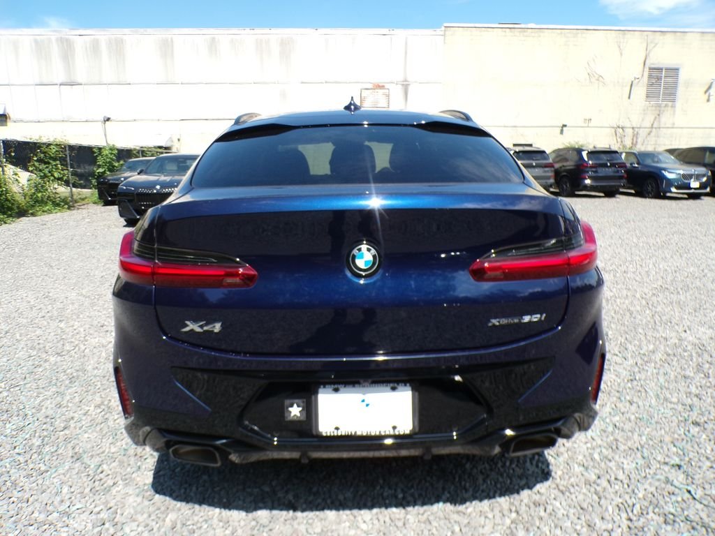 Certified Used 2023 Tanzanite Blue II Metallic BMW xDrive30i image 4