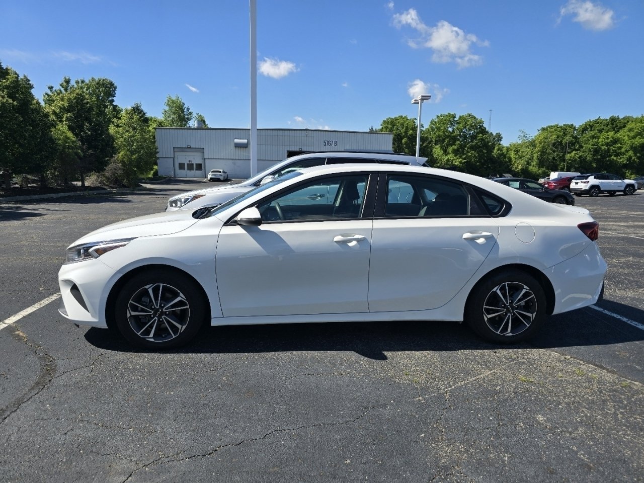 Used 2023 White Kia LXS image 4