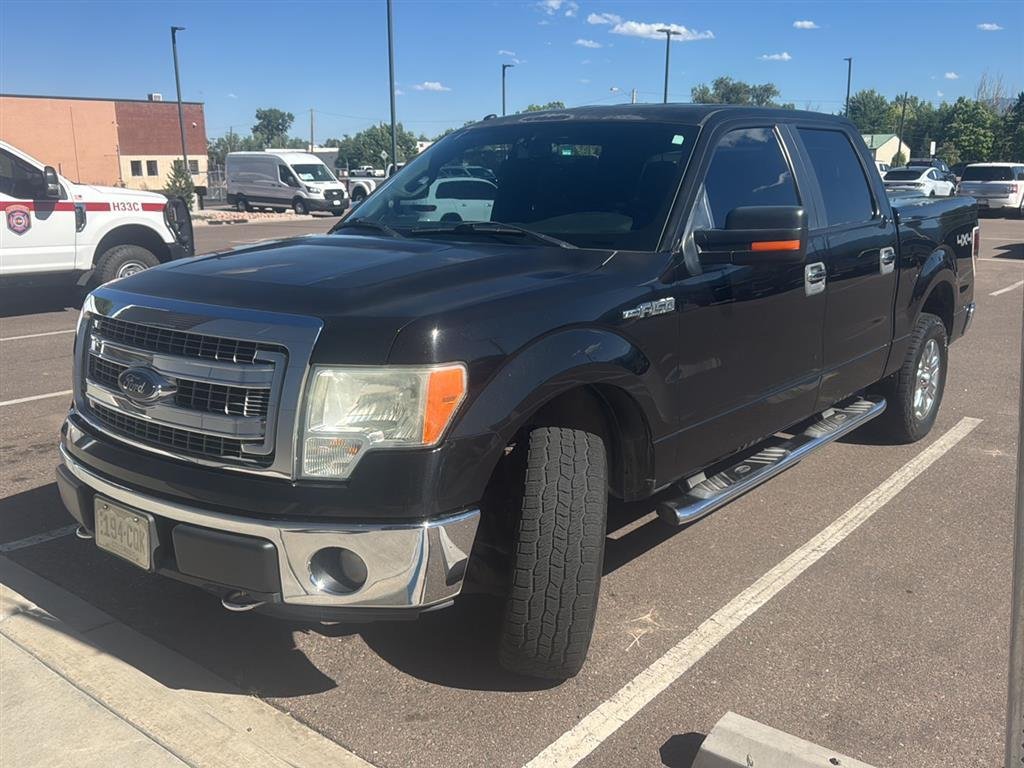 Used 2013 Tuxedo Black Metallic Ford XLT image 1
