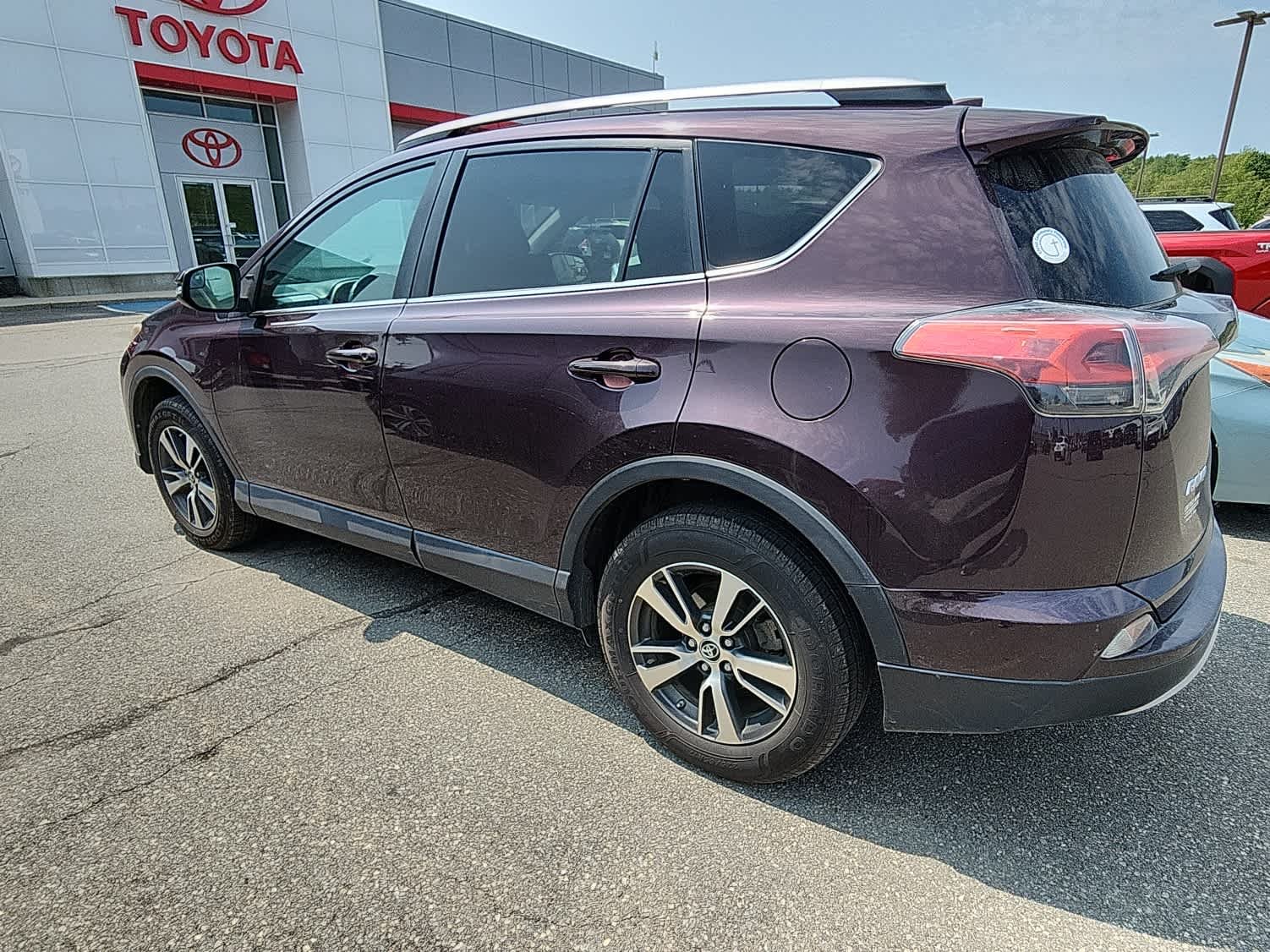 Used 2016 Black Currant Metallic Toyota XLE image 2