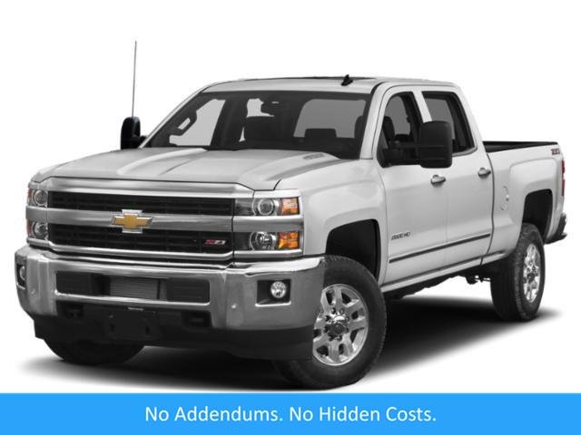 Used 2015 DEEP RUBY METALLIC Chevrolet LTZ image 1