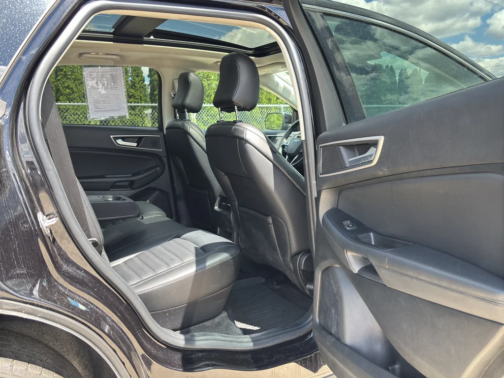 Used 2024 Agate Black Metallic Ford SEL image 13