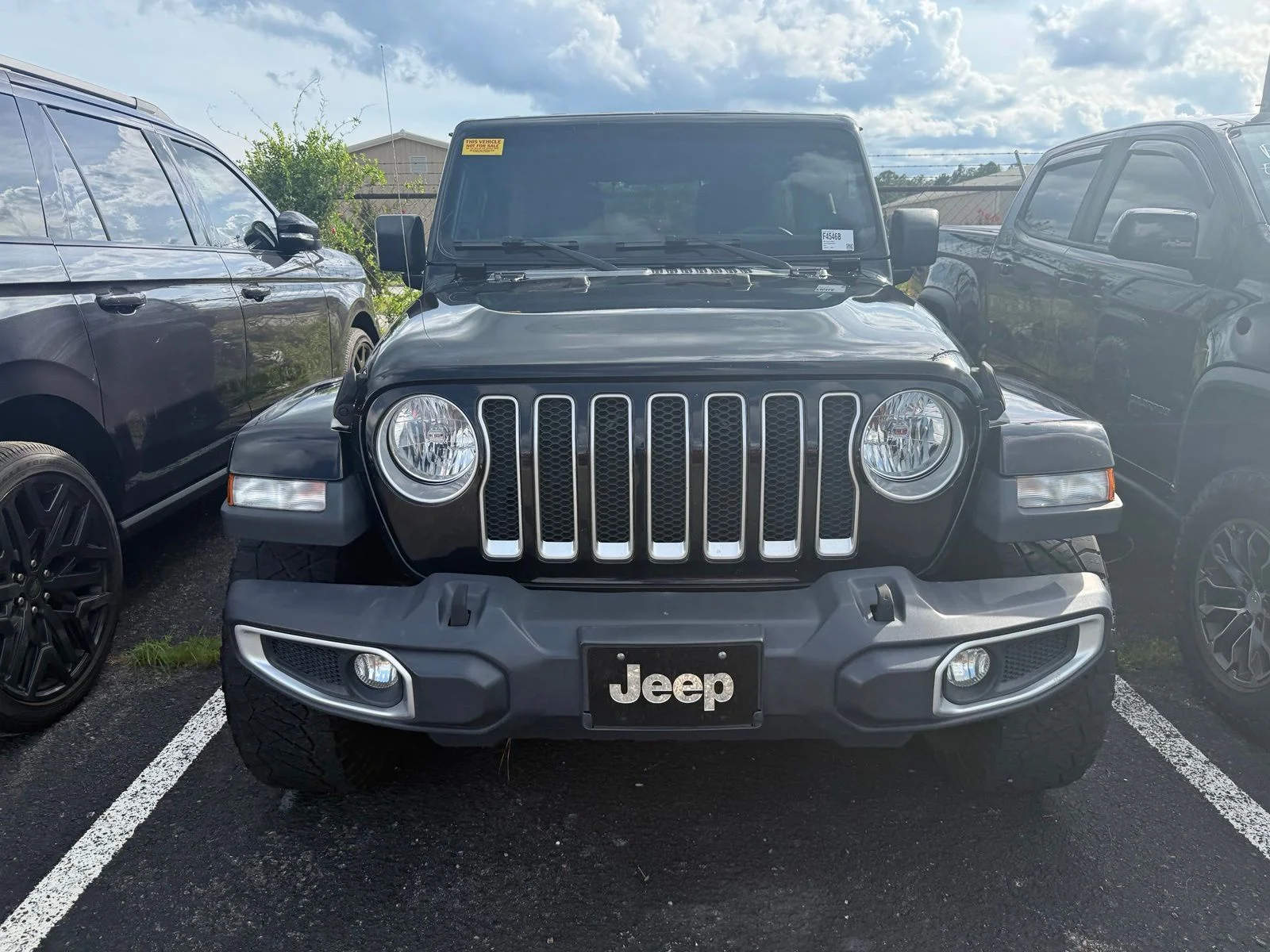 Used 2019 Black Jeep Unlimited Sahara image 1