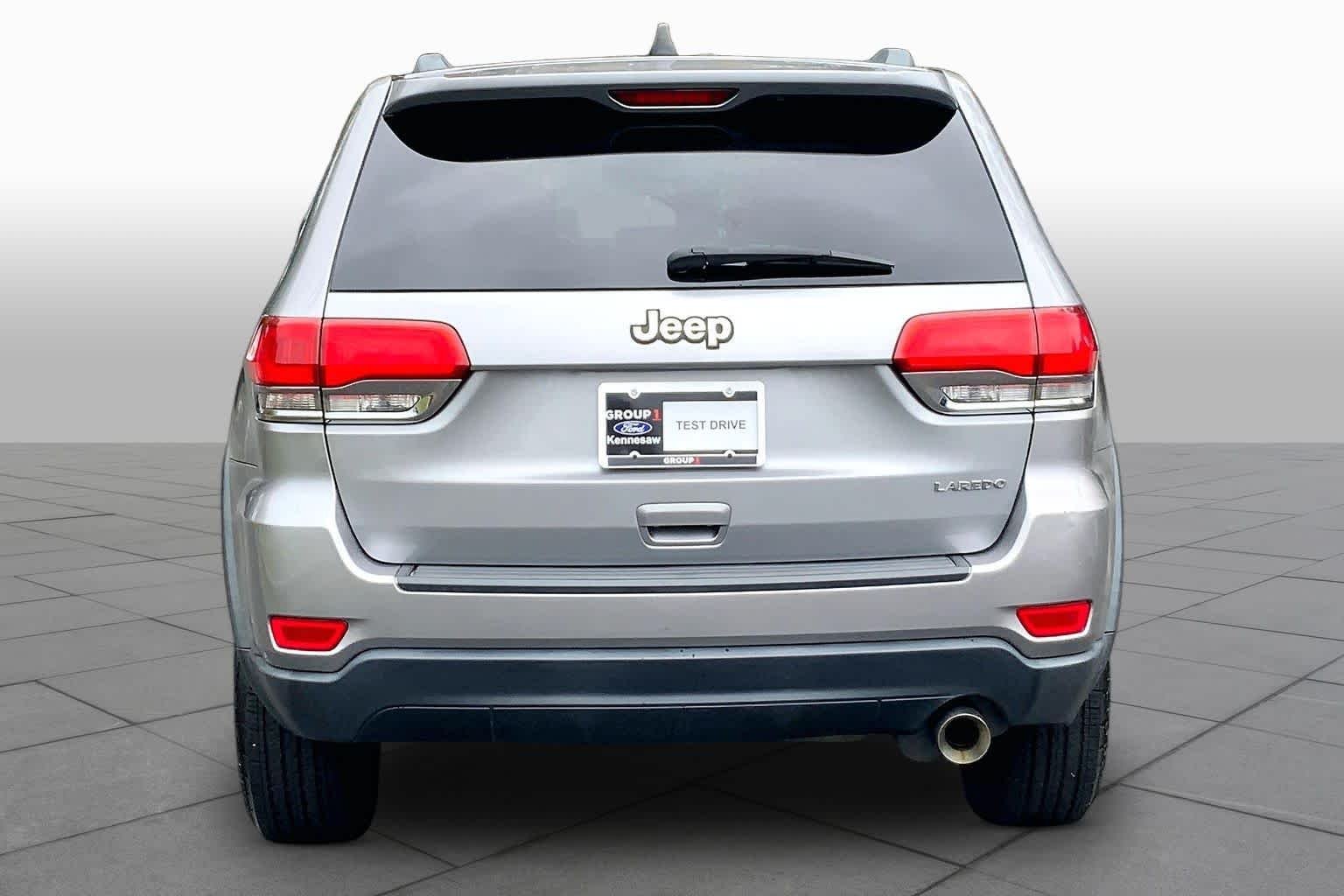 Used 2014 Billet Silver Metallic Clearcoat Jeep Laredo image 4