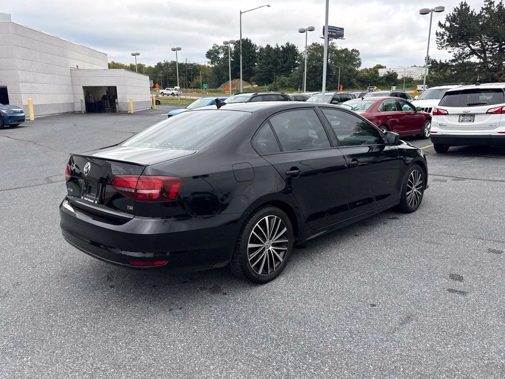 Used 2016 Black Uni Volkswagen 1.8T Sport image 13