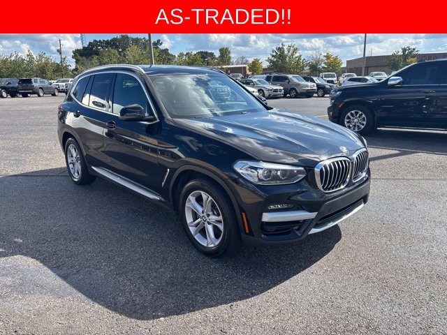 Used 2020 Black BMW sDrive30i image 1