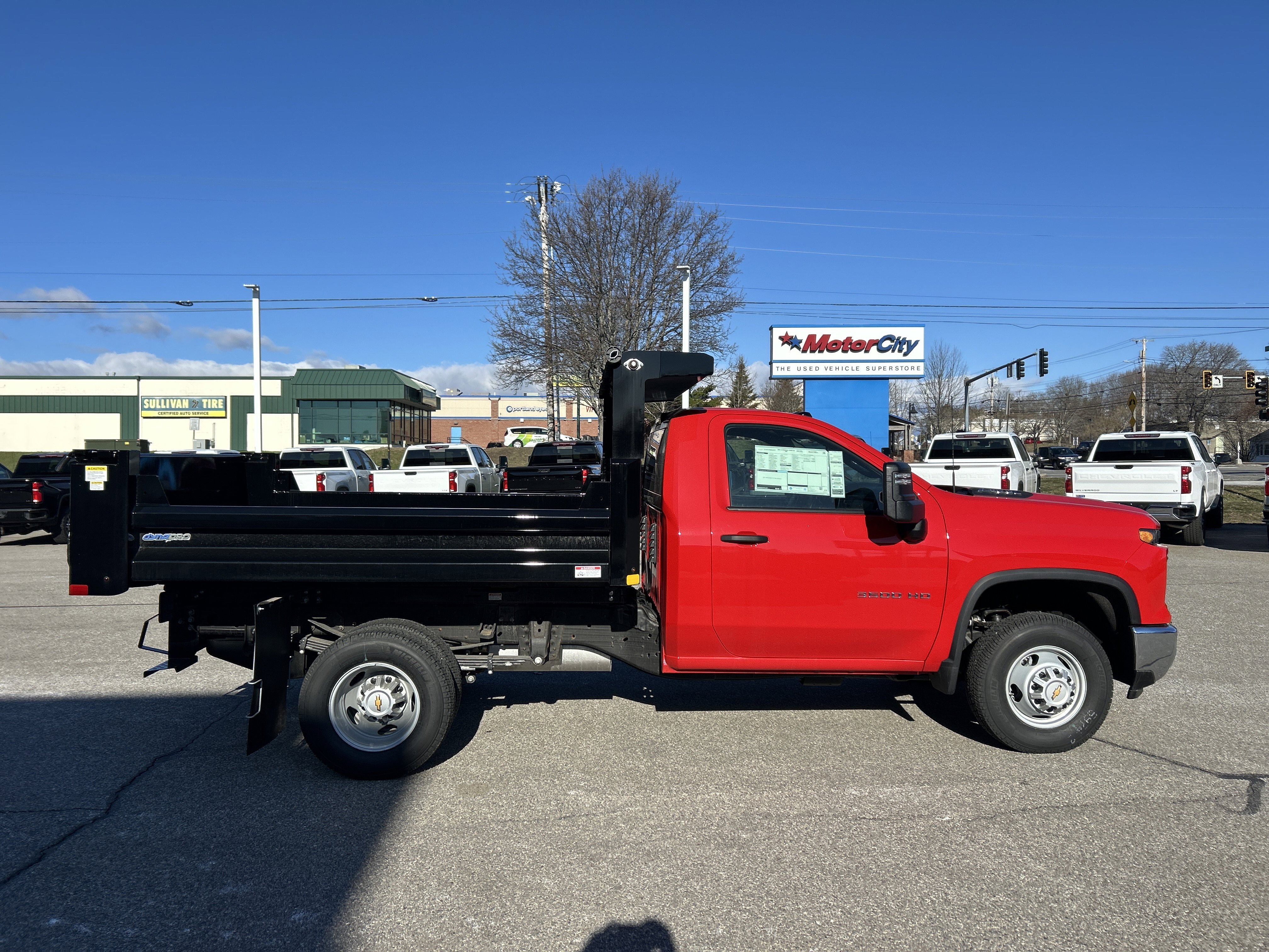 New 2026 Red Hot Chevrolet Work Truck image 7