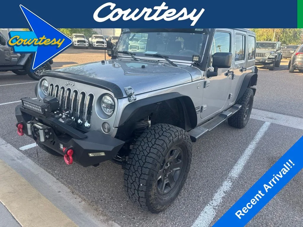 Used 2016 Silver Jeep Unlimited Sport image 1