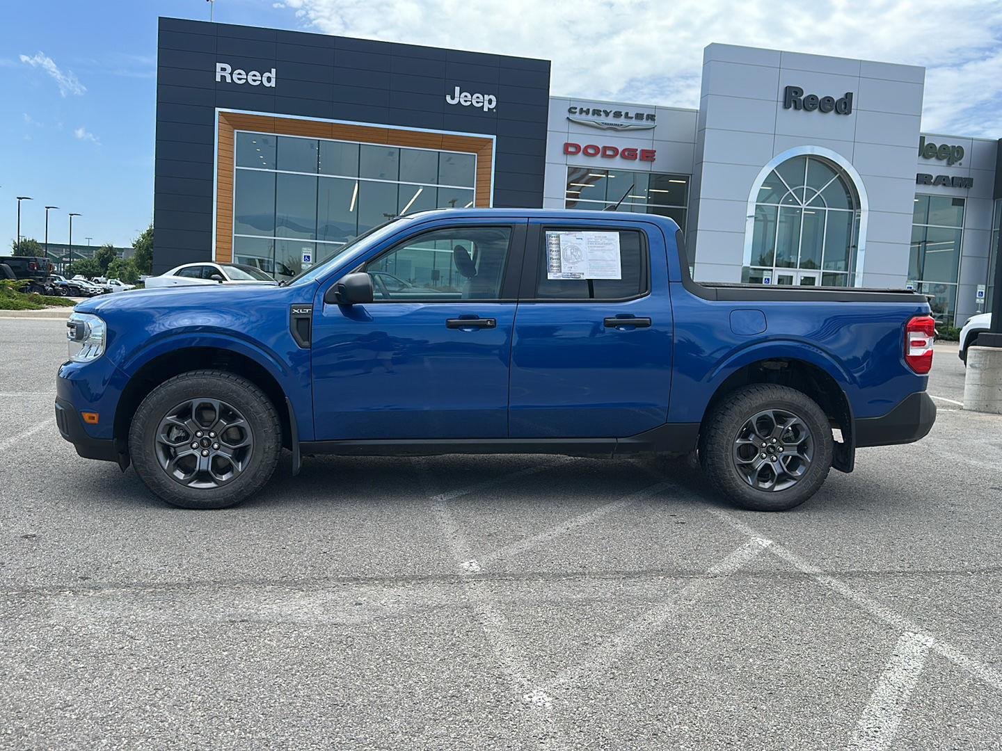 Used 2024 Atlas Blue Metallic Ford XLT image 2