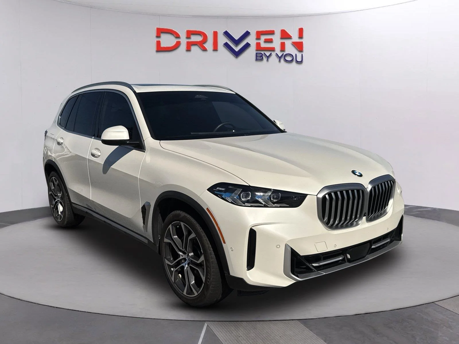 Used 2024 Mineral White Metallic BMW sDrive40i image 1