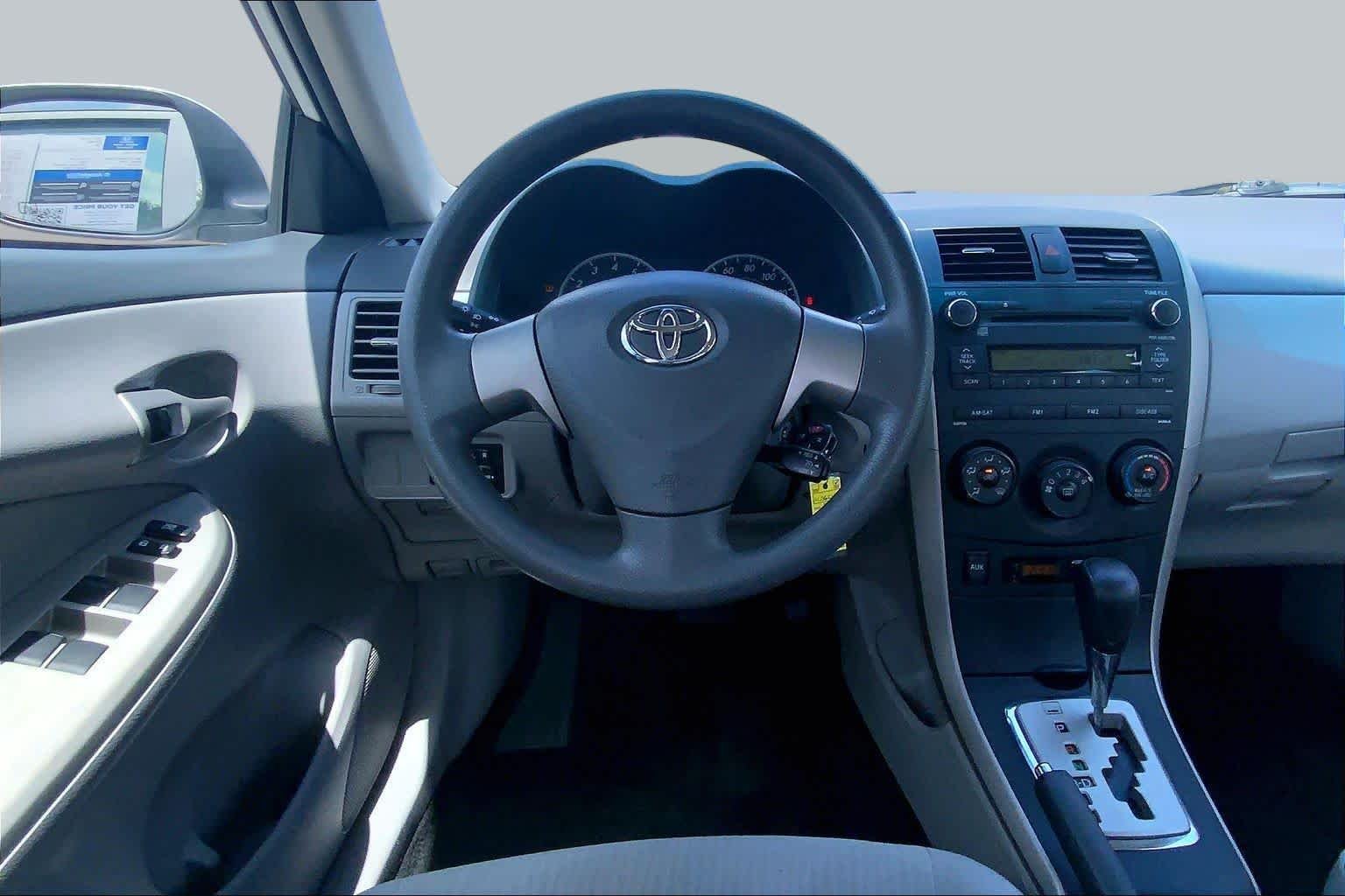 Used 2010 Super White Toyota LE image 5