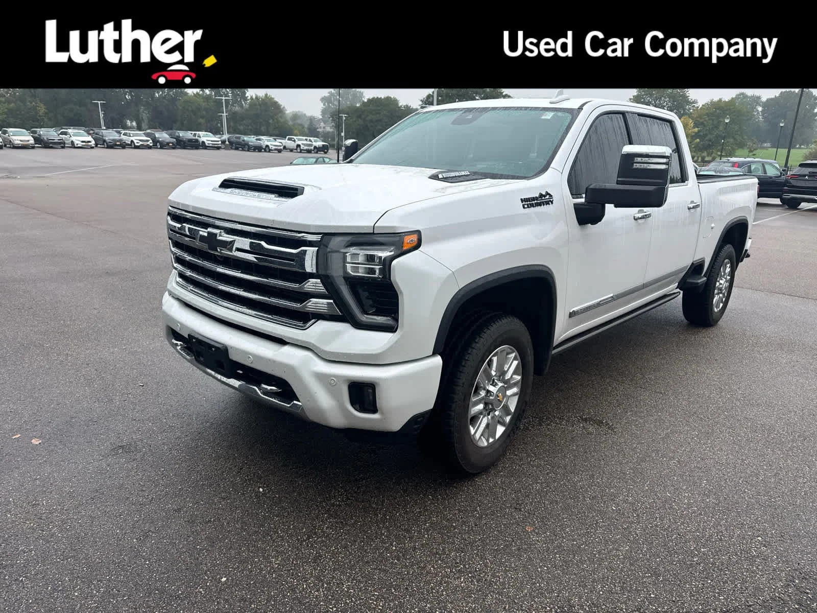 Used 2024 Iridescent Pearl Tricoat Chevrolet High Country image 1