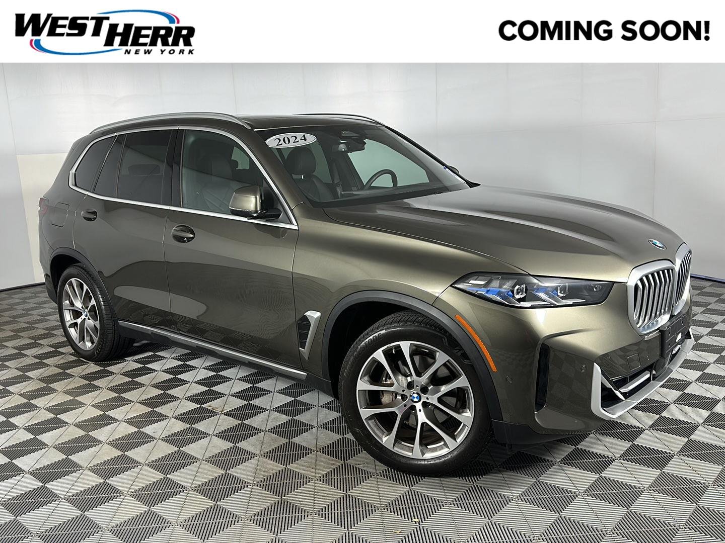 Used 2024 Manhattan Green Metallic BMW xDrive40i image 1