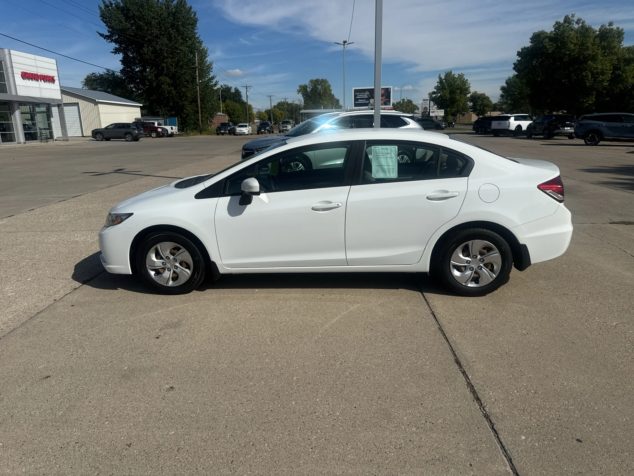 Used 2014 Taffeta White Honda LX image 1