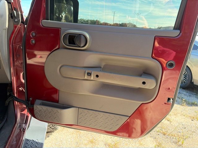 Used 2010 Red Jeep Unlimited Sahara image 14