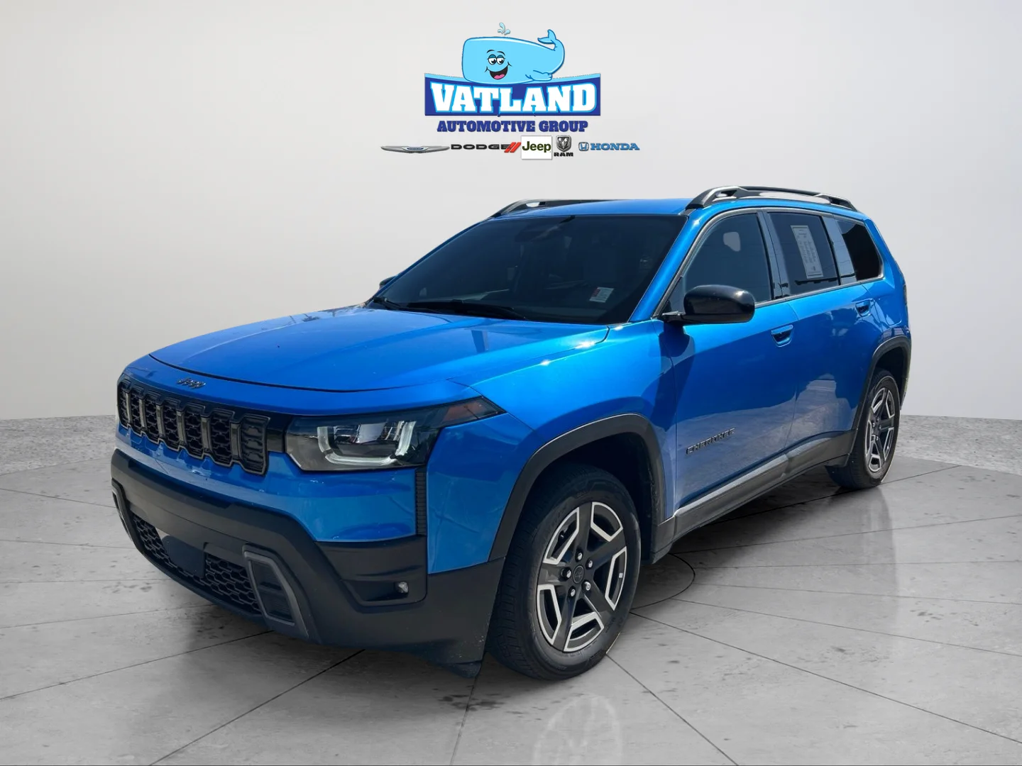 Used 2026 Blue Pearl Jeep Laredo image 1