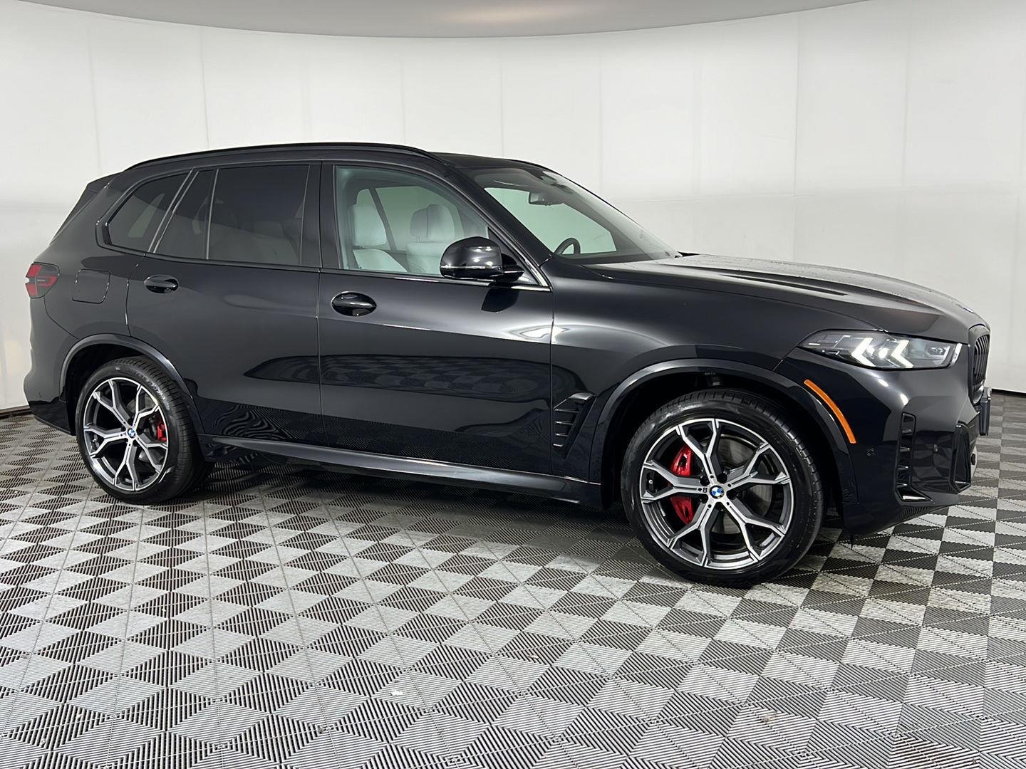 New 2026 Black Sapphire Metallic BMW xDrive40i image 3