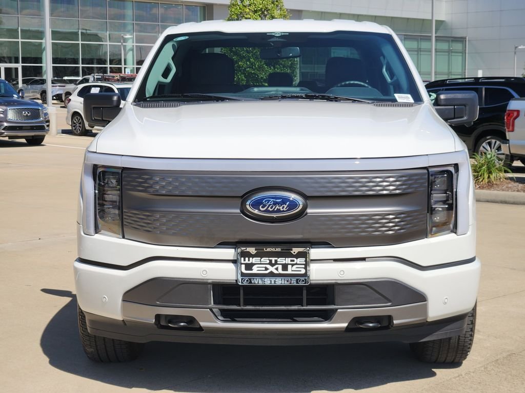 Used 2023 Ford F-150 Lightning XLT with VIN 1FTVW1EL2PWG40487 for sale in Houston, TX