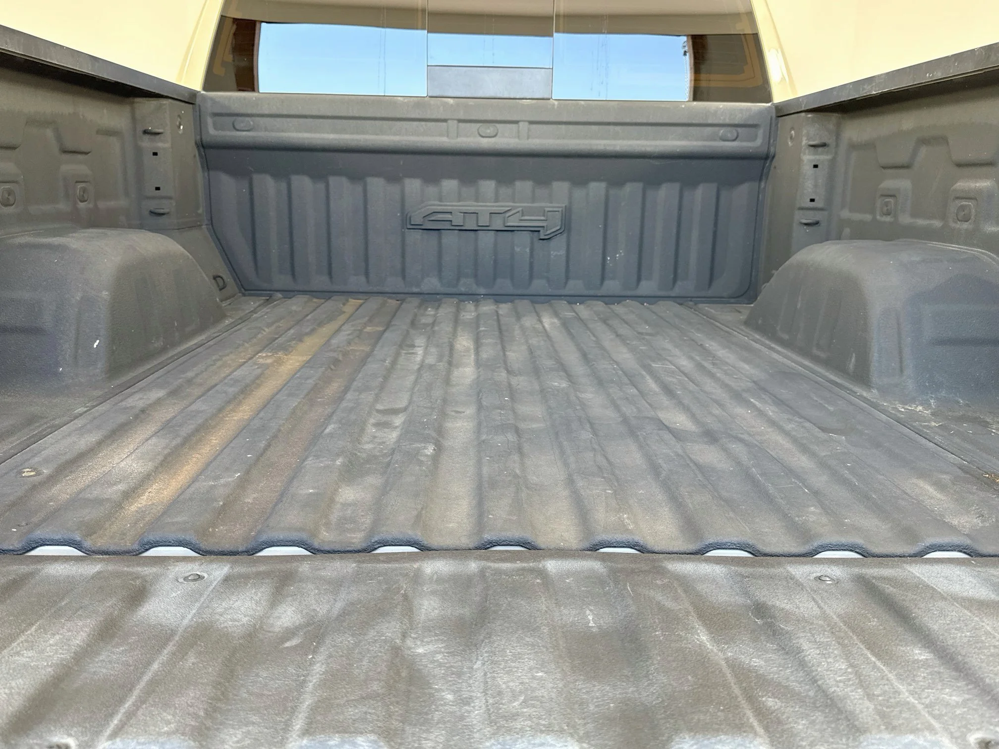 Used 2023 DESERT SAND METALLIC GMC AT4 image 7