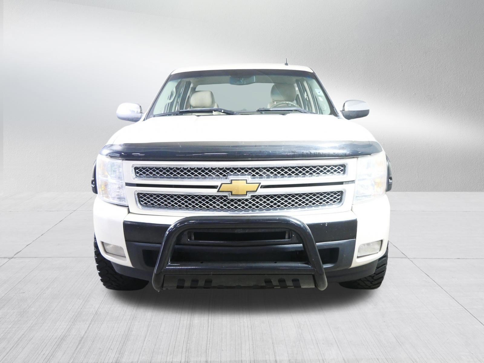 Used 2013 Chevrolet Silverado 1500 LTZ with VIN 3GCPKTE74DG180147 for sale in Brooklyn Center, MN