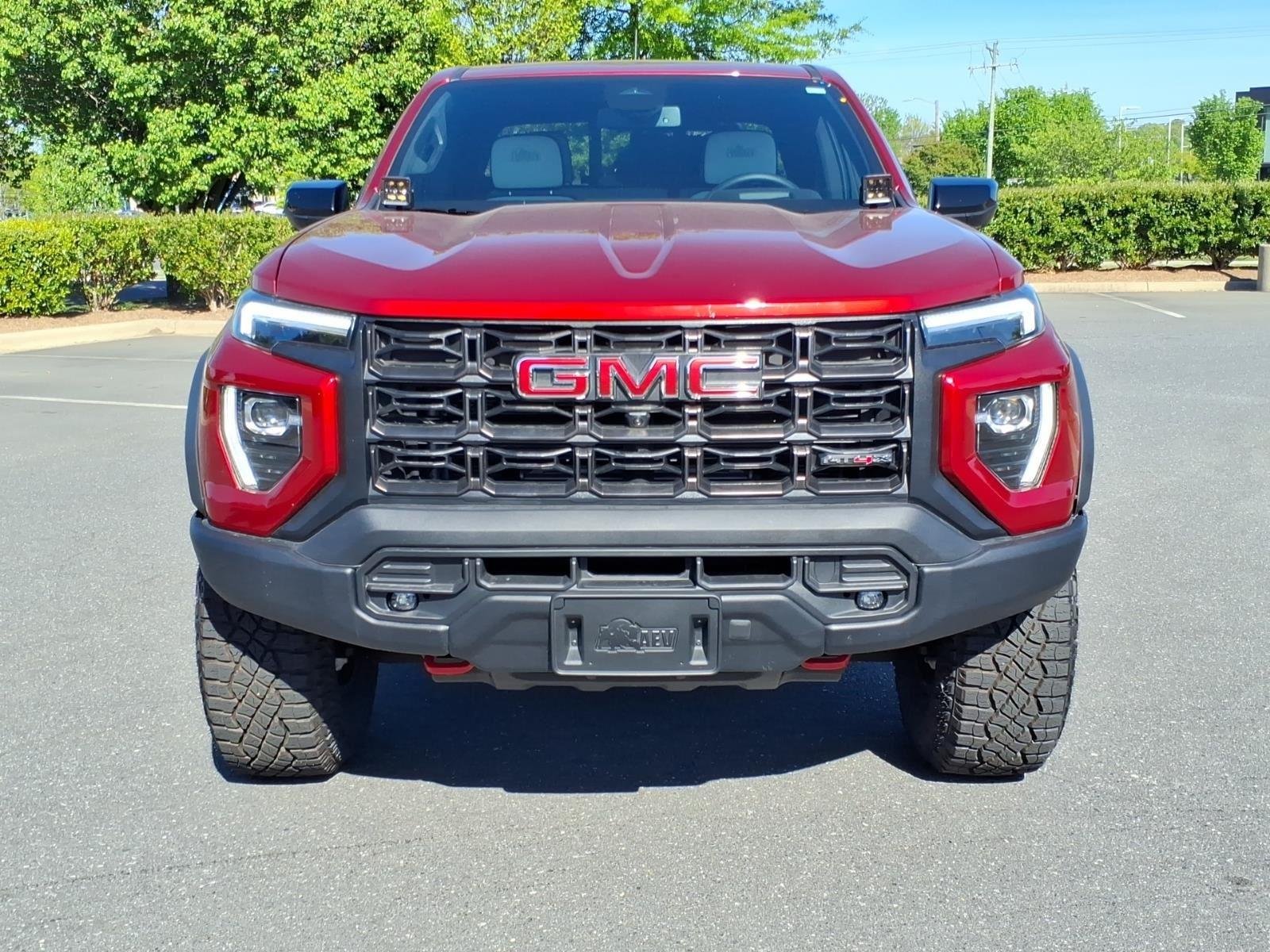 Used 2024 Volcanic Red Tintcoat GMC 4WD AT4X image 14