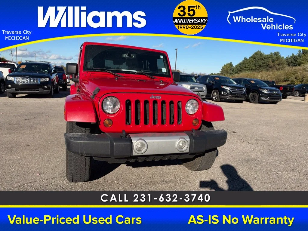 Used 2013 Flame Red Jeep Unlimited Sahara image 21