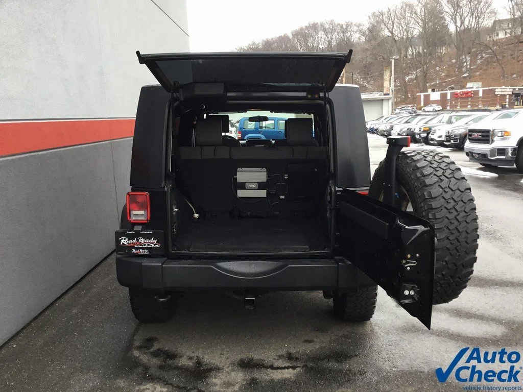 Used 2010 Black Jeep Unlimited Sport image 13