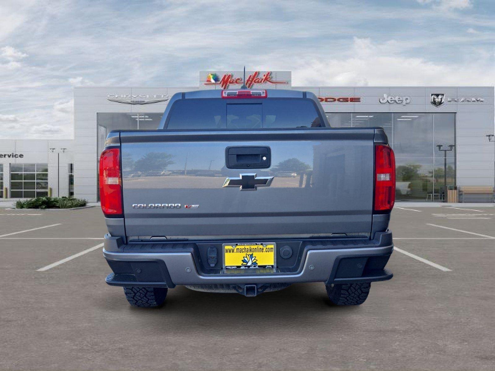 Used 2020 Silver Ice Metallic Chevrolet 4WD Z71 image 4