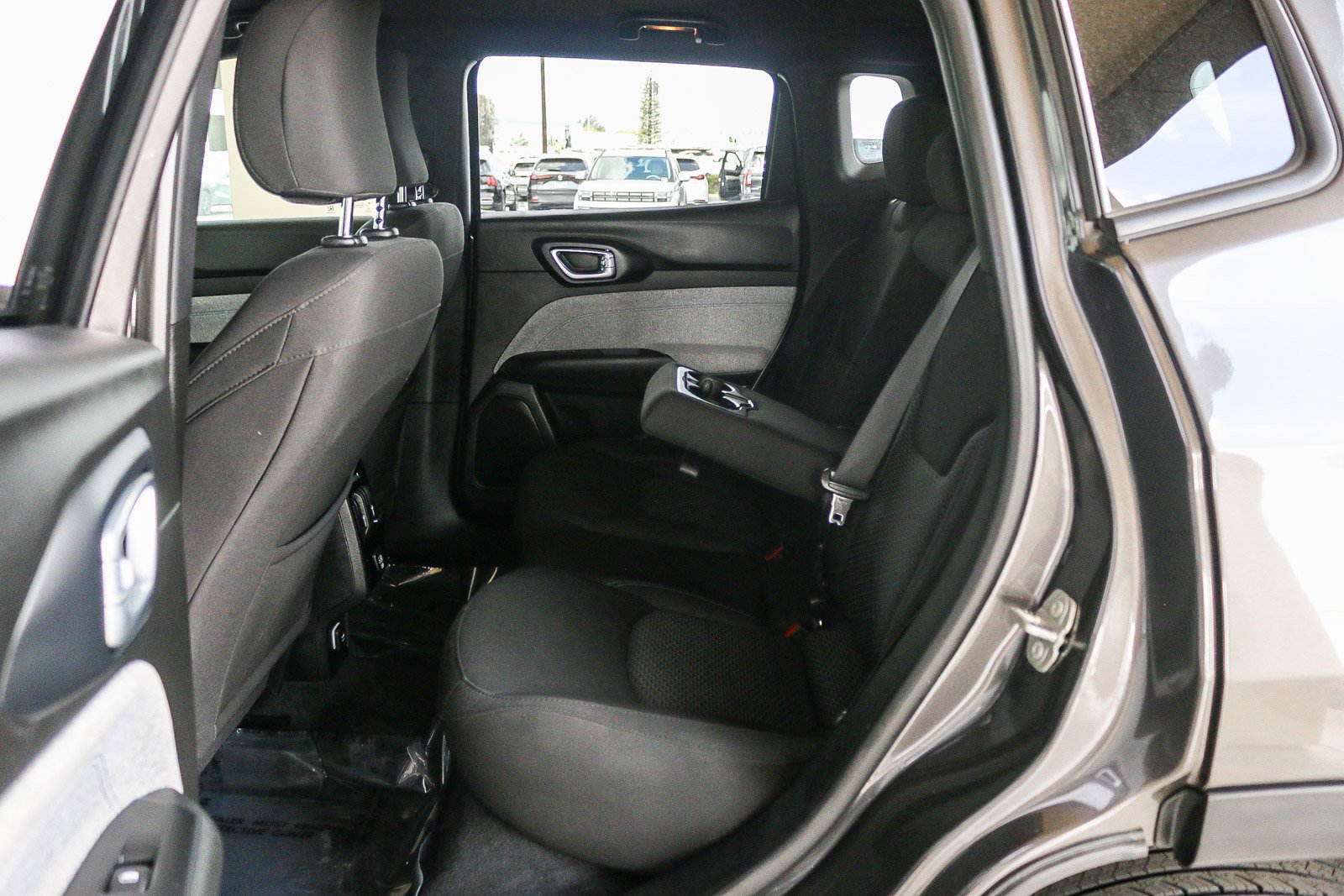 Used 2023 Granite Crystal Metallic Clearcoat Jeep Sport image 19