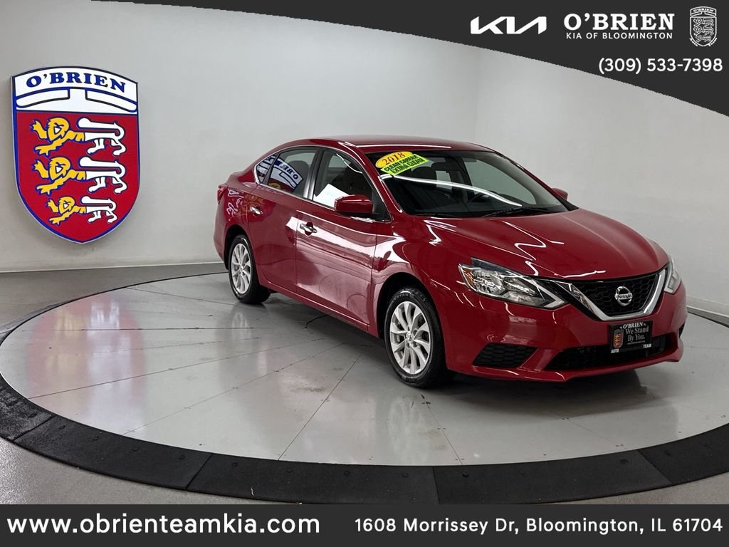 Used 2018 Red Alert Nissan SV image 1