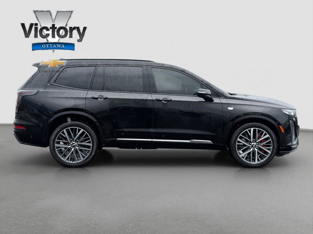 Used 2023 Stellar Black Metallic Cadillac Sport image 7