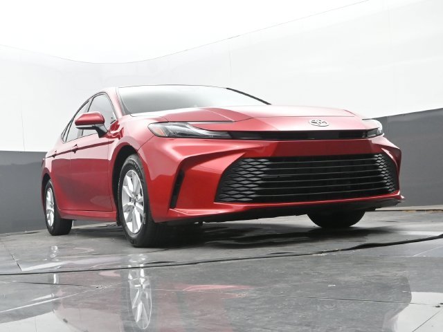 Used 2025 Supersonic Red Toyota LE image 32