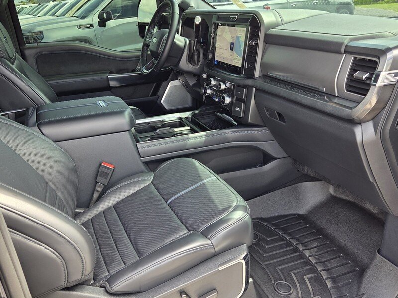 Used 2025 Blue Metallic FORD PLATINUM 4WD CREW CAB 6.75