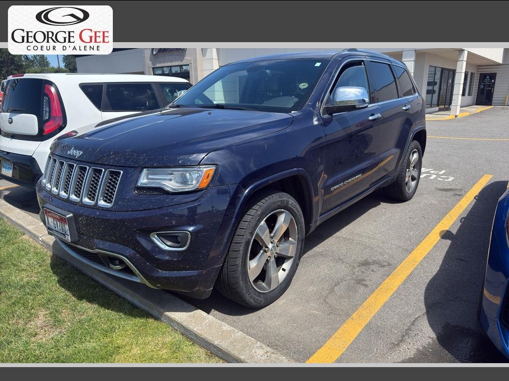 Used 2015 True Blue Pearlcoat Jeep Overland image 1