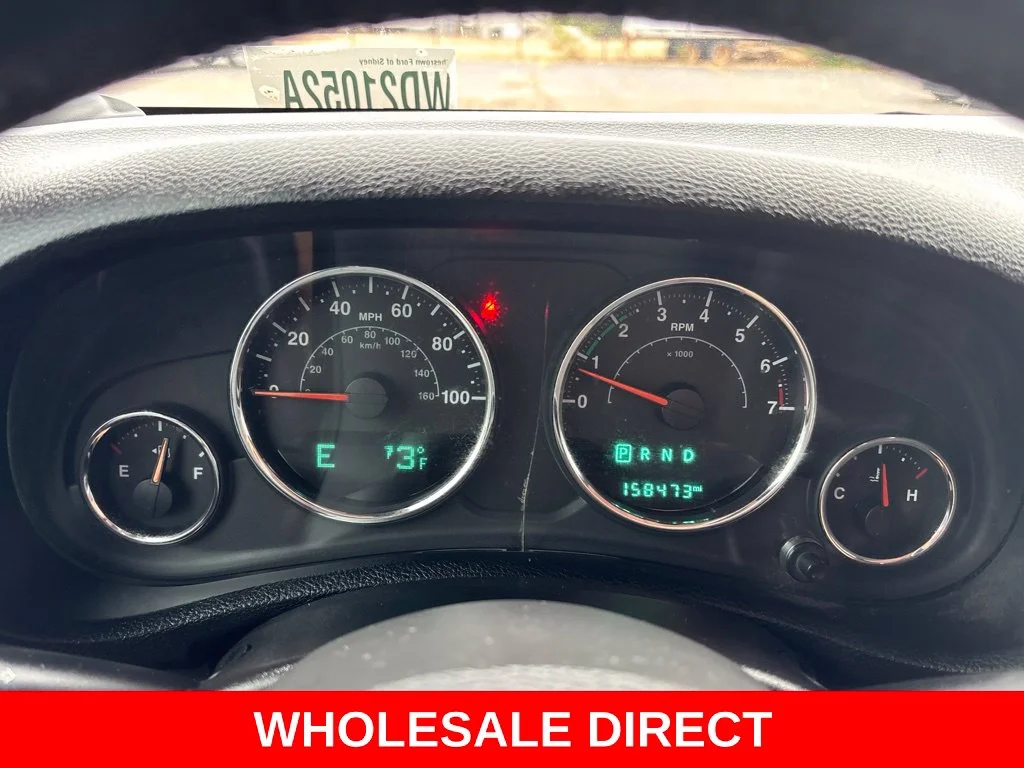 Used 2015 Red Jeep Unlimited Sport image 13