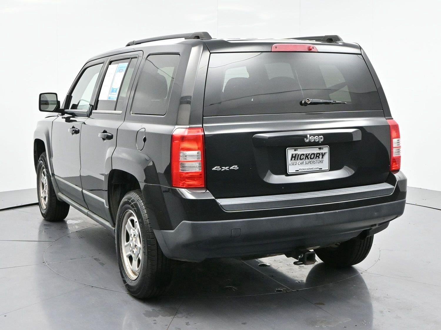 Used 2011 Brilliant Black Crystal Pearl Jeep Sport image 5