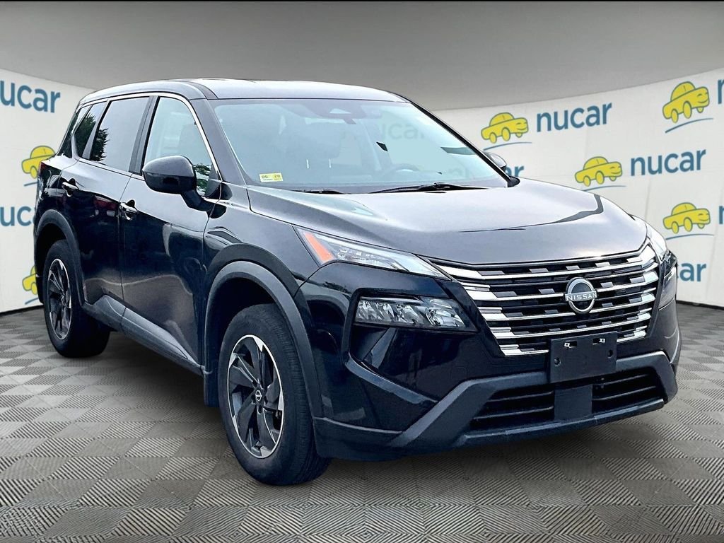 Used 2024 Black Nissan SV image 1