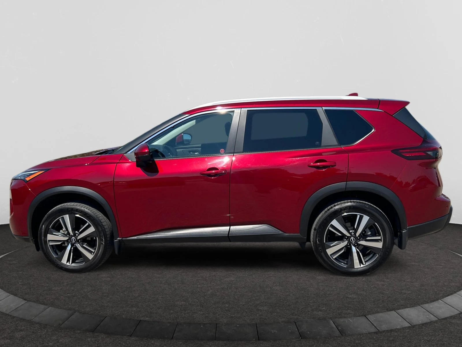 Used 2024 RED METALLIC Nissan SV Moonroof AWD image 2