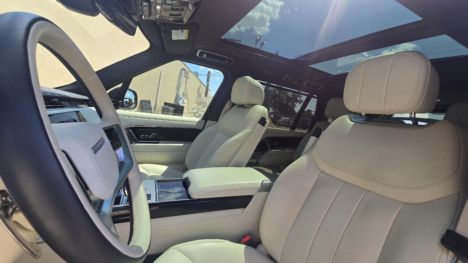 Used 2025 Santorini Black Metallic Land Rover SE image 12