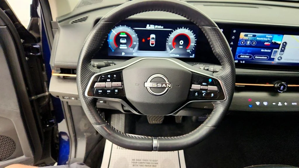 Used 2025 Deep Ocean Blue Pearl/Black Diamond Pearl Nissan EVOLVE+ FWD image 13