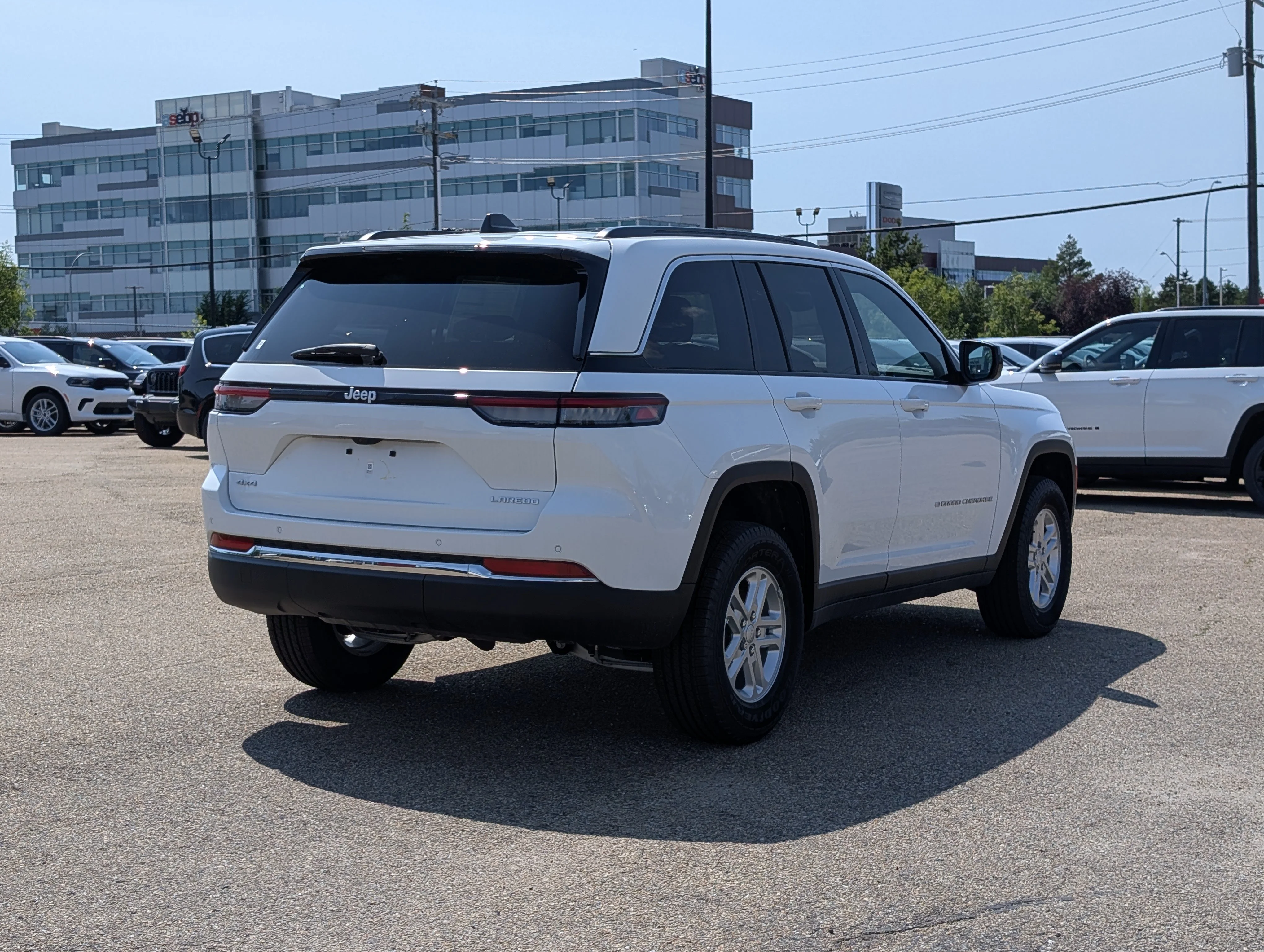 New 2025 Bright White Jeep Laredo image 7
