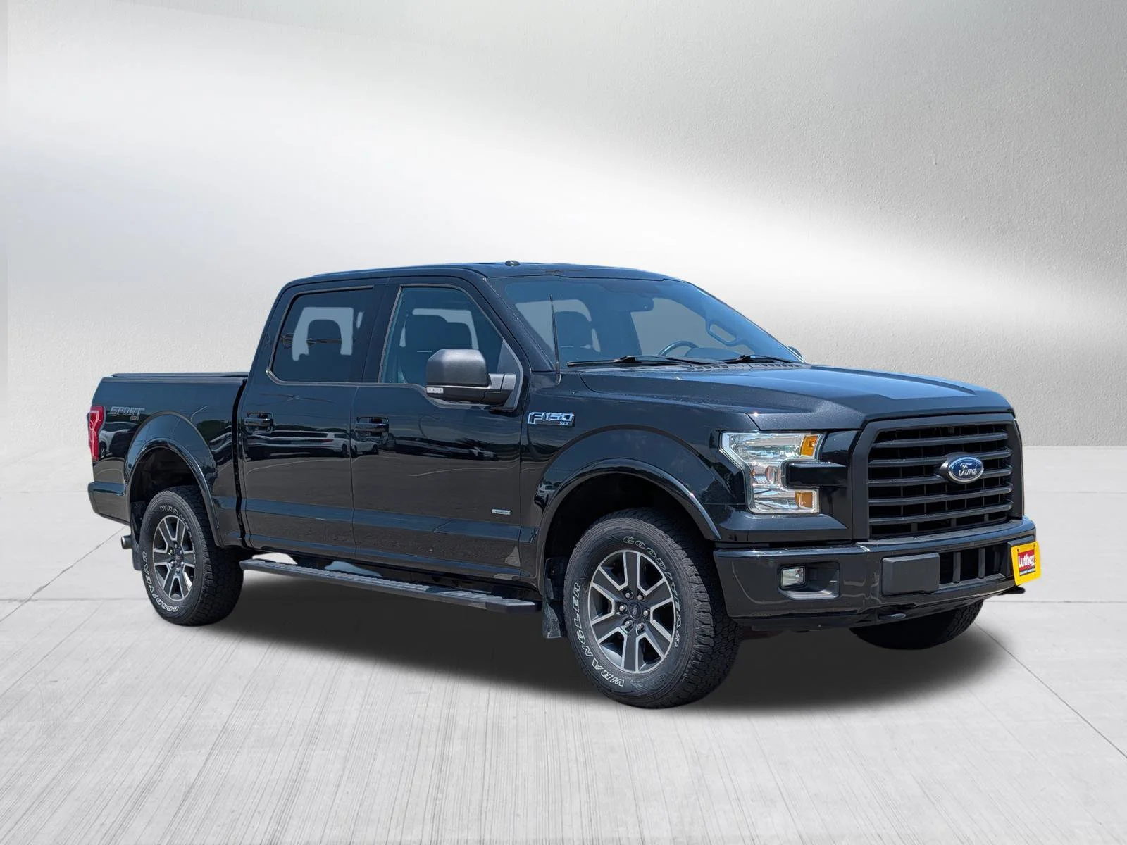 Used 2015 Tuxedo Black Metallic Ford XLT image 1