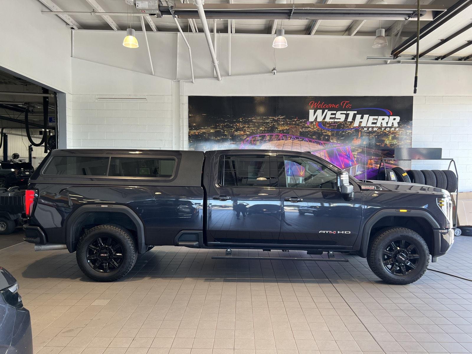Used 2024 Titanium Rush Metallic GMC AT4 image 9