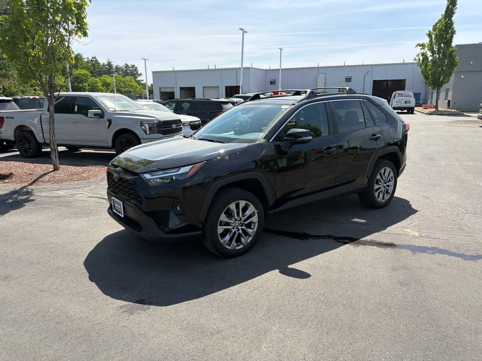 Used 2024 Midnight Black Metallic Toyota XLE Premium image 1