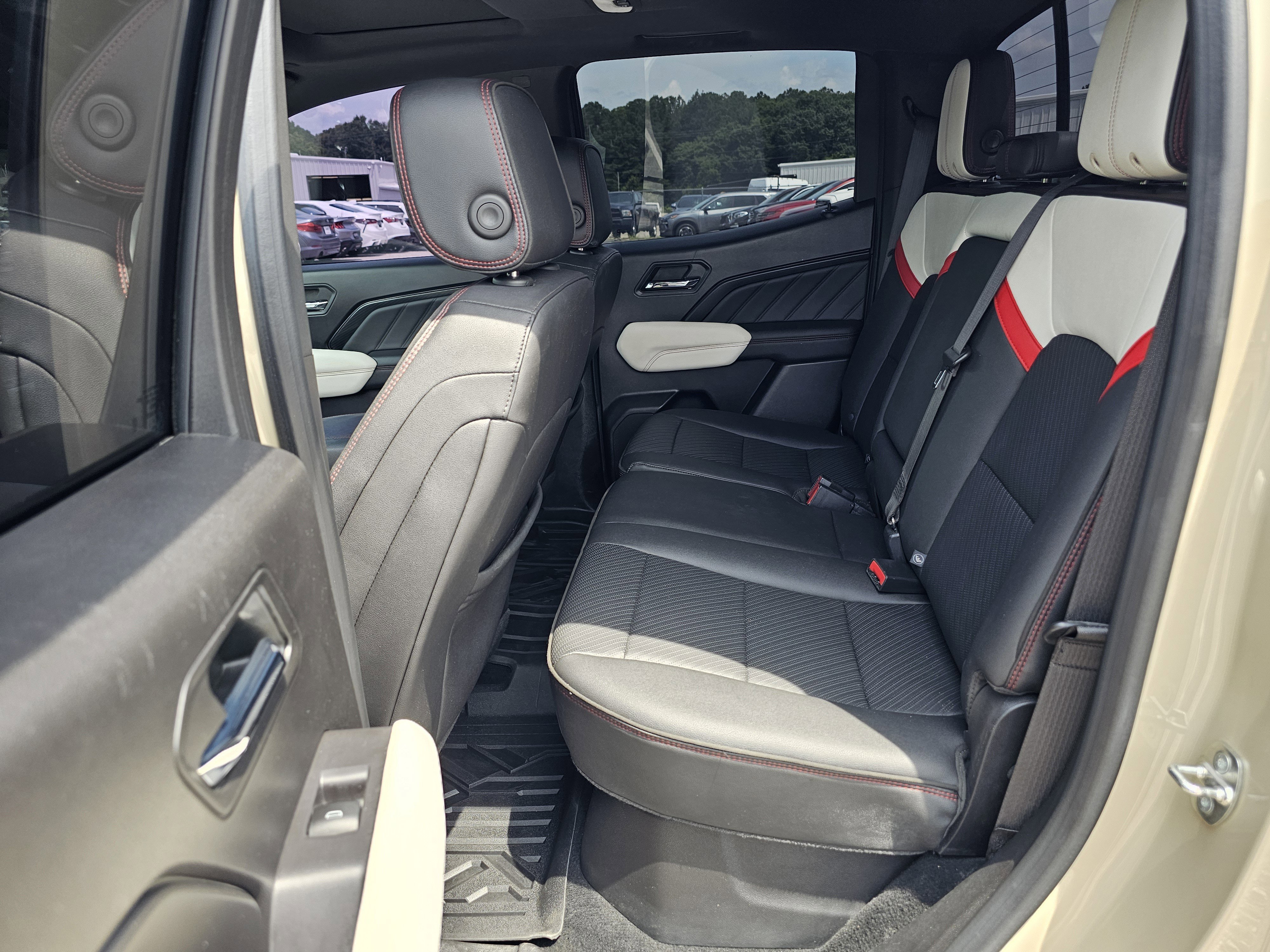 Used 2023 Desert Sand Metallic GMC 4WD AT4X image 32