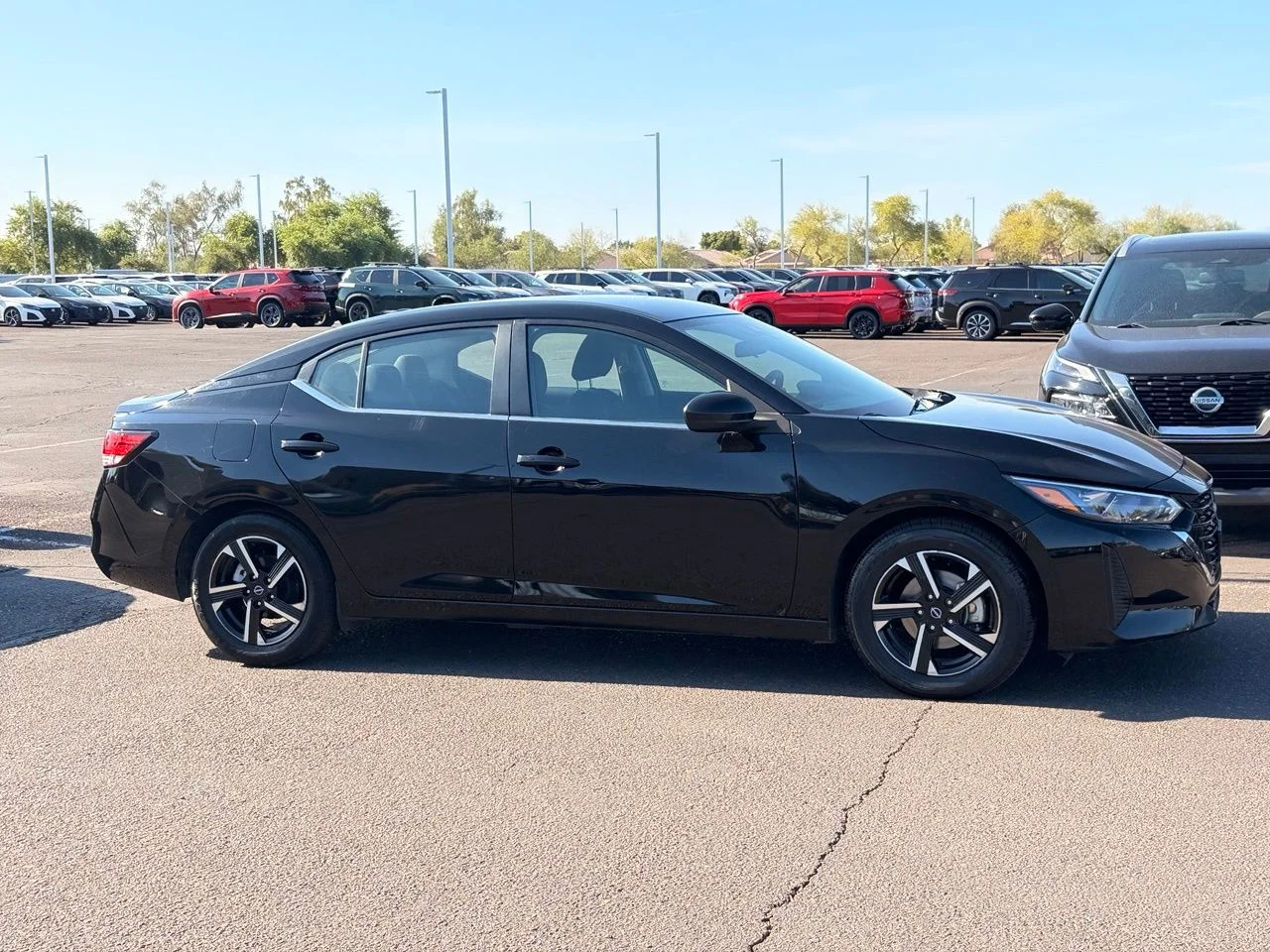 Used 2024 Super Black Nissan SV image 6
