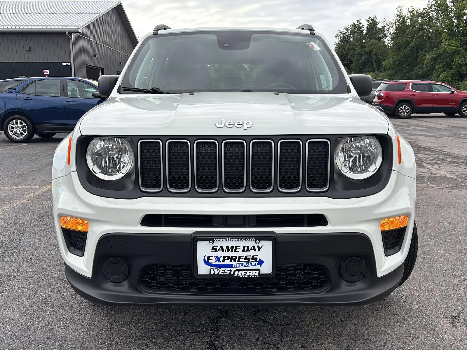 Used 2022 Alpine White Clearcoat Jeep Sport image 2